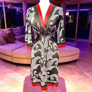Black Paisley Faux Wrap Dress with Red Trim. Large Rhinestones in Center! FAB ♥️